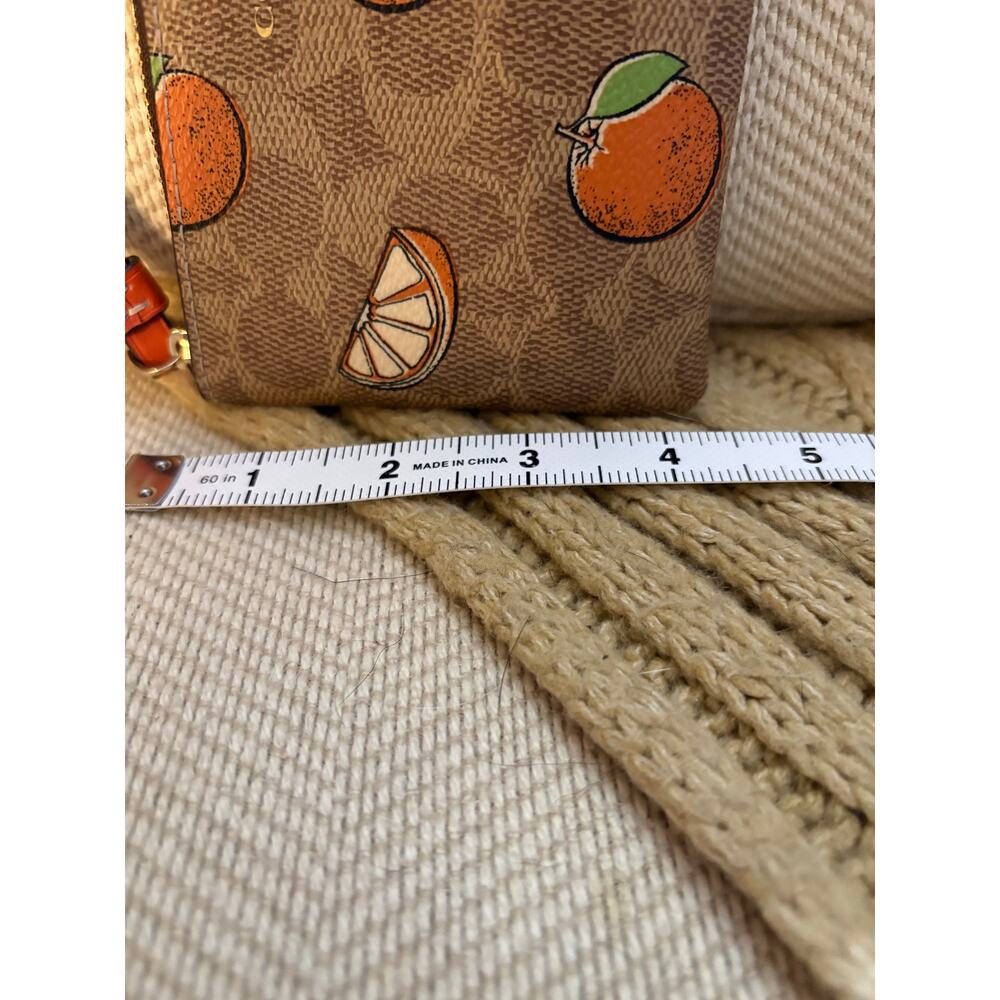 Coach Corner Zip Wristlet in Signature Canvas with Orange Print CBB82 - Picture 9 of 9